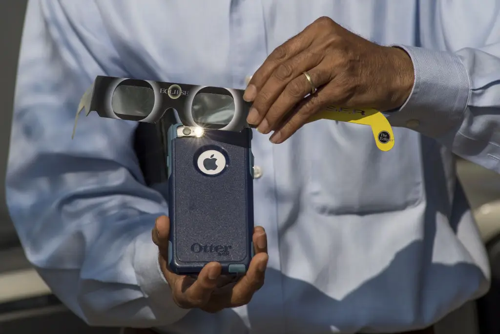 Your phone camera needs protecting too during a solar eclipse (Bloomberg / Contributor / Getty Images)