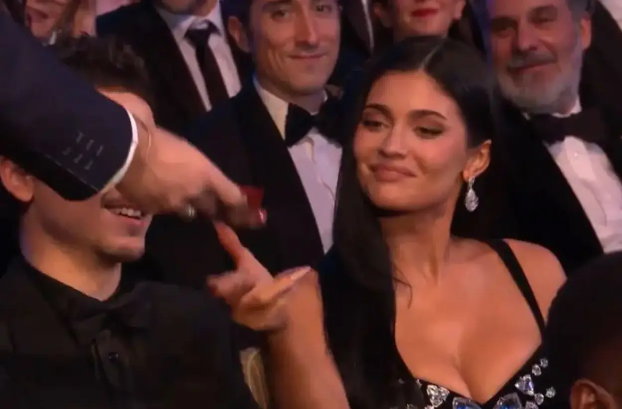 Cumming offered Jenner a Jammie Dodger snack (BBC)