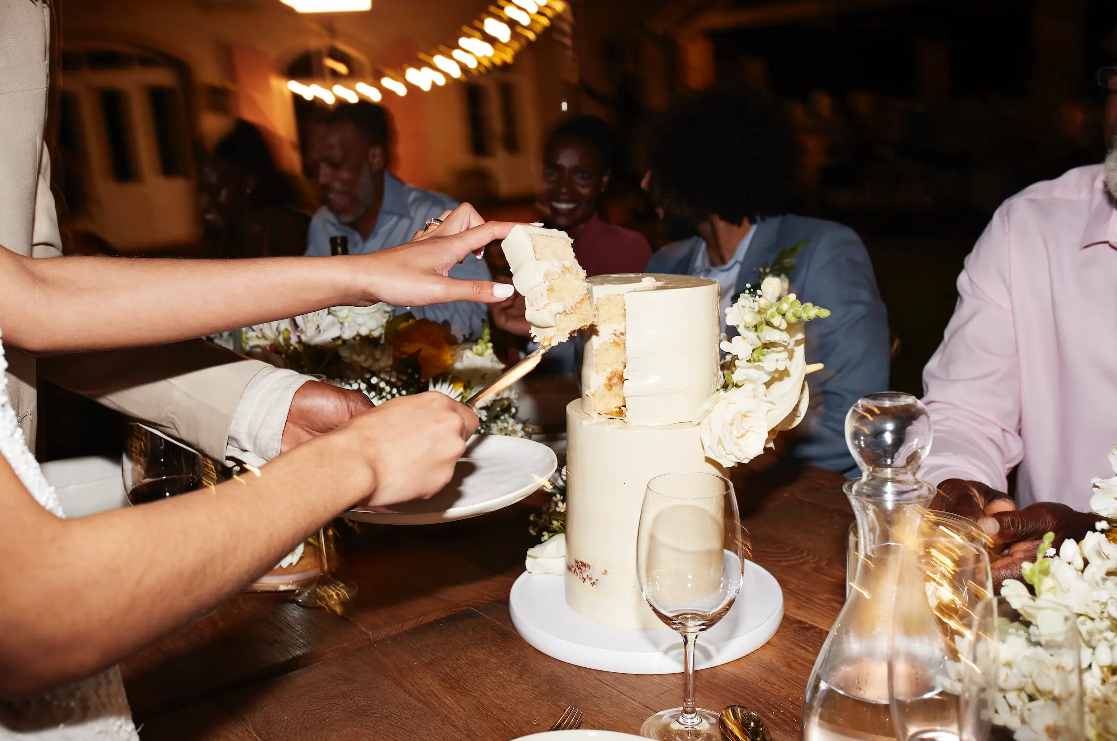 The 'cake smash' typically occurs during the reception (Getty Stock Image)