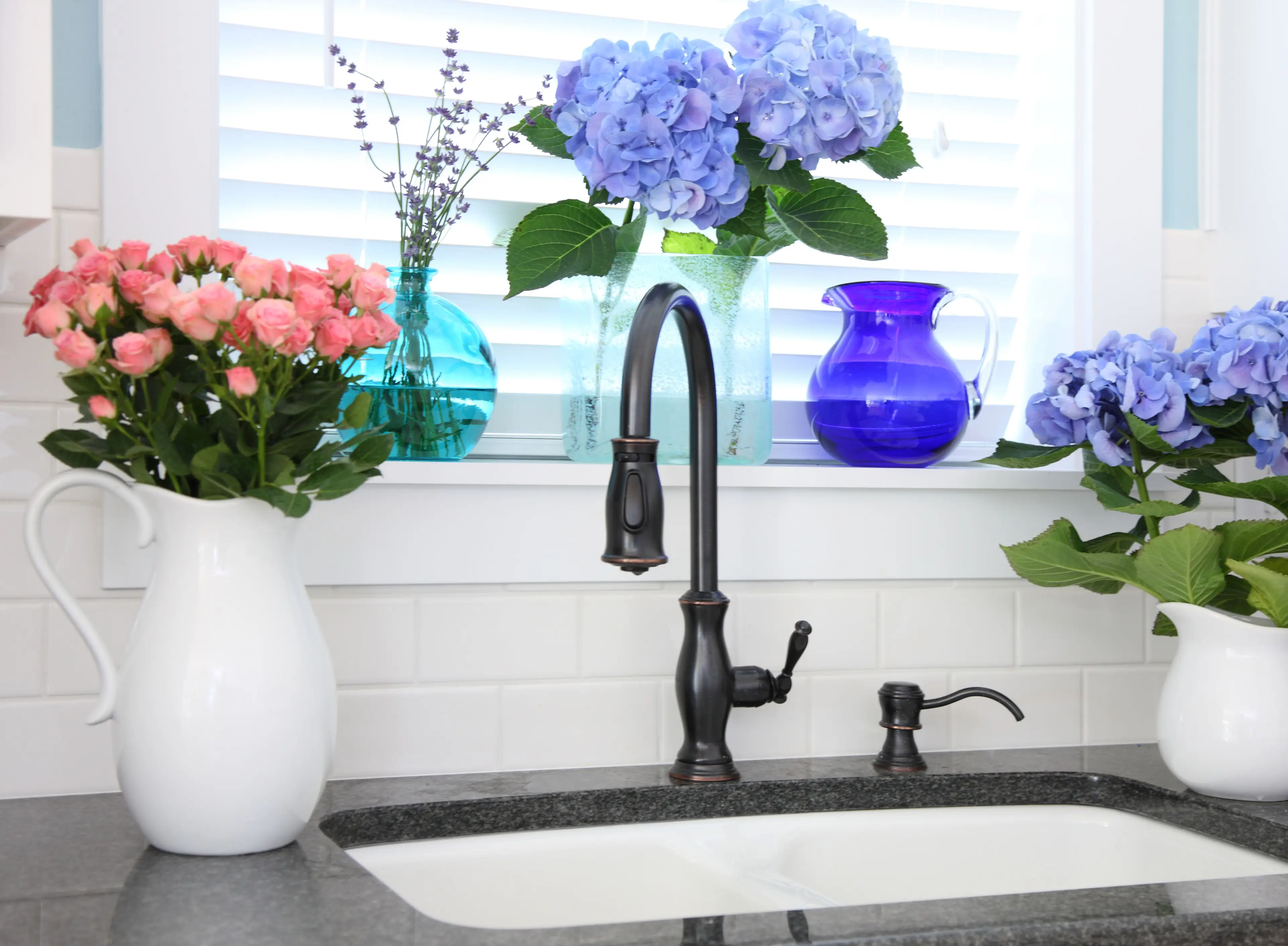 Have you ever wondered why kitchen sinks always seem to be underneath a window? (