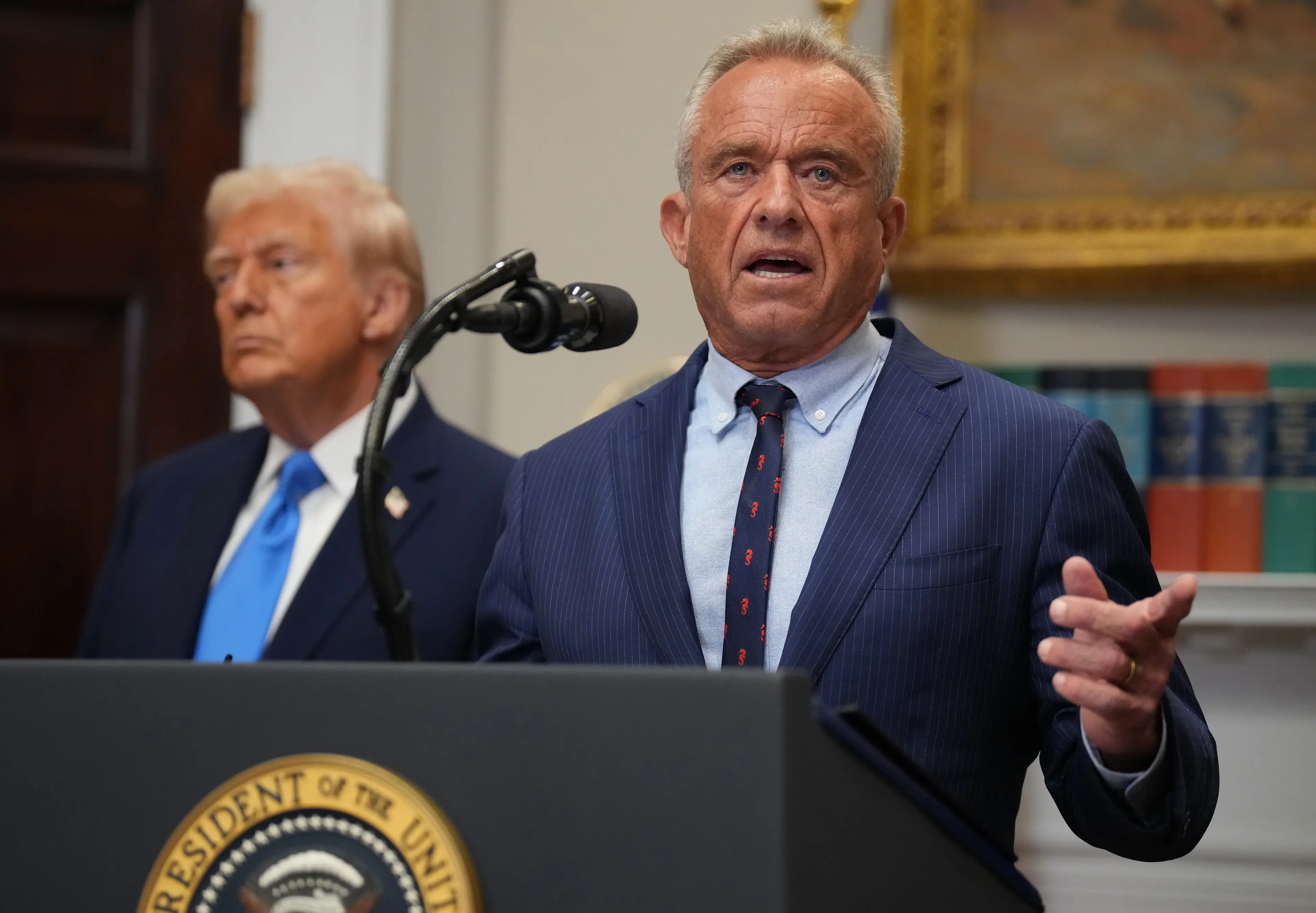 US Health and Human Services Secretary Robert F. Kennedy Jr. and Donald Trump held a press conference yesterday (Andrew Harnik/Getty Images)