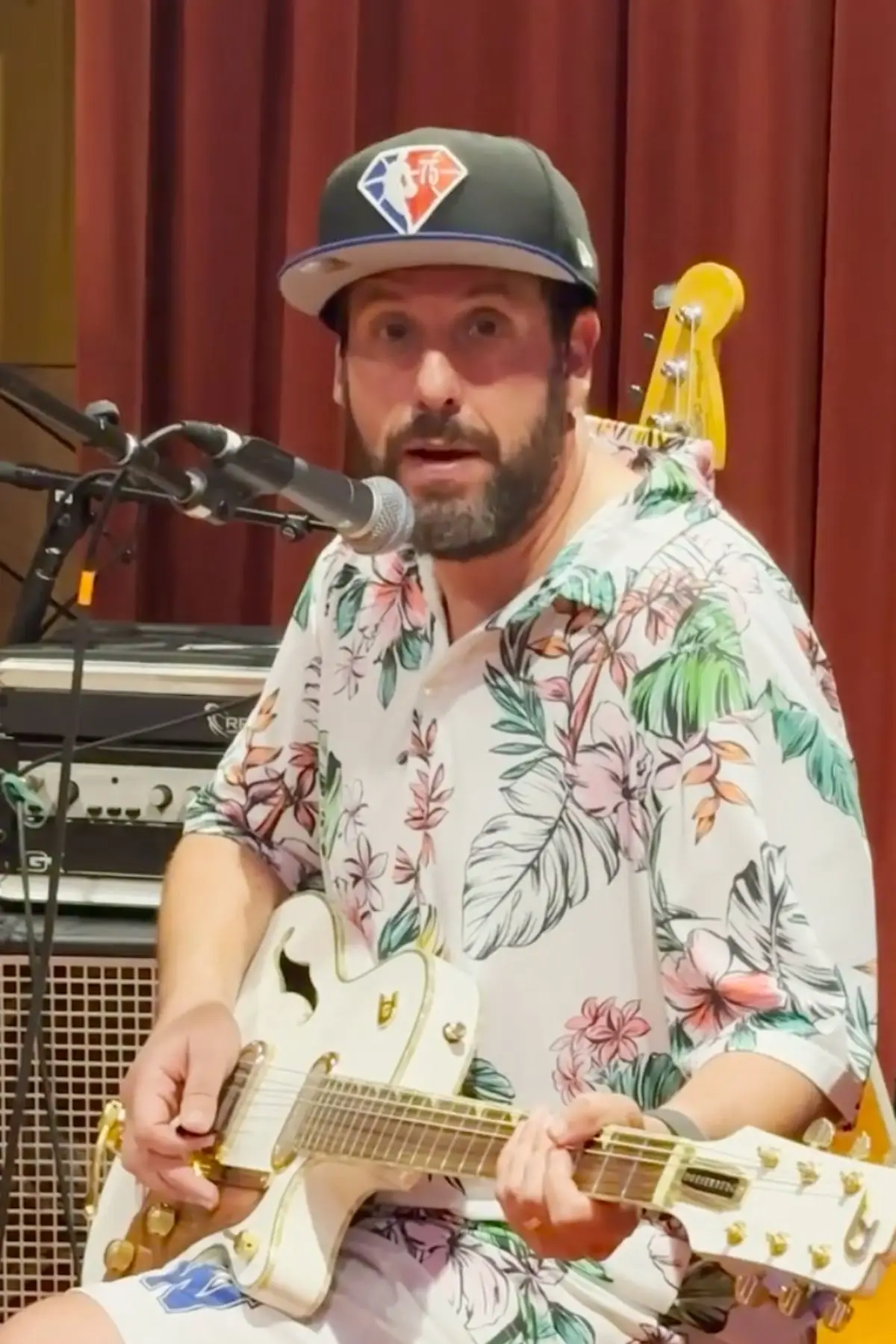 The icon revealed he wore baggy clothes in his younger days to 'surprise' people with his body (Instagram/@adamsandler)