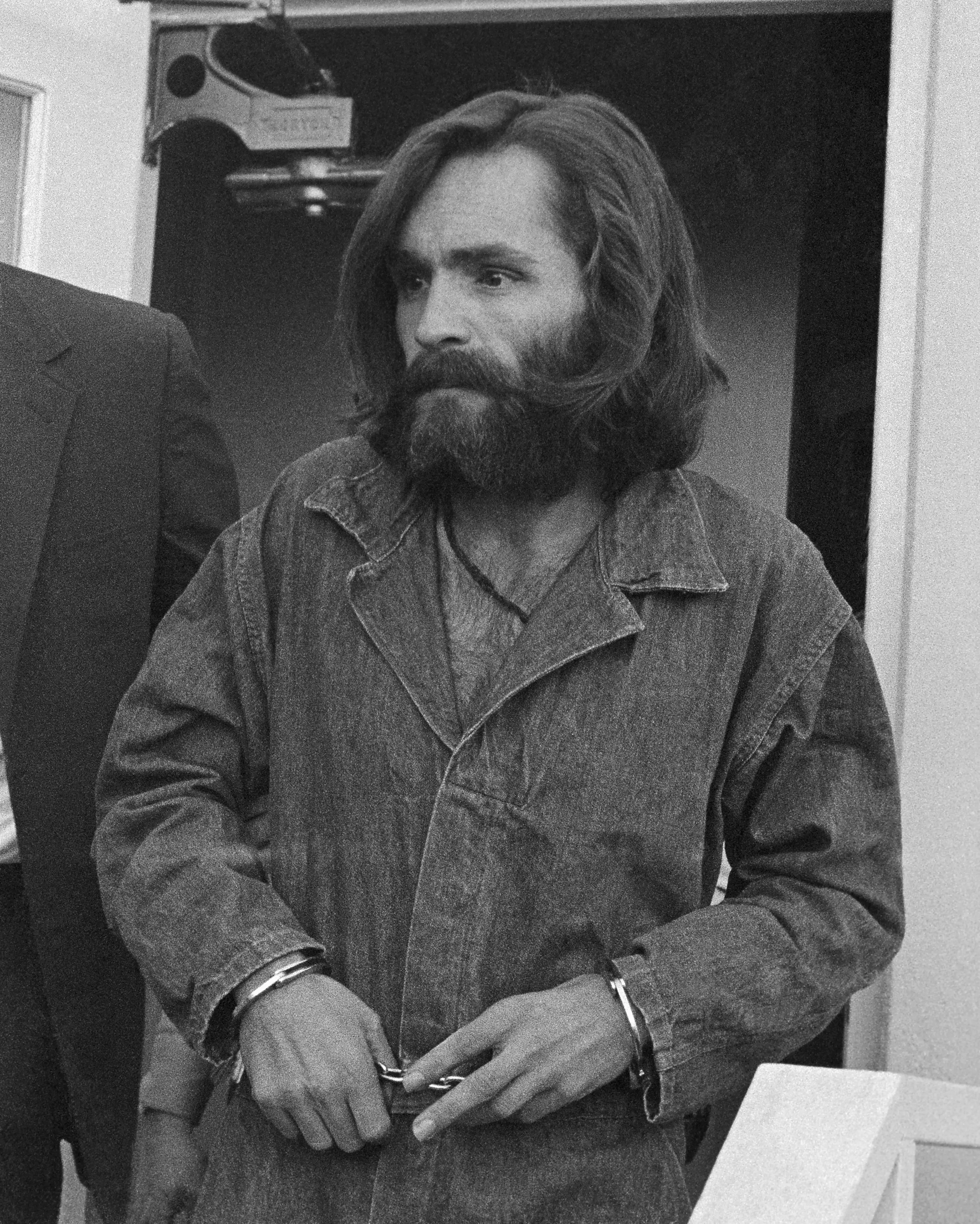 Charles Manson pictured arriving at the Inyo County Courthouse in 1969 (Bettmann / Contributor)