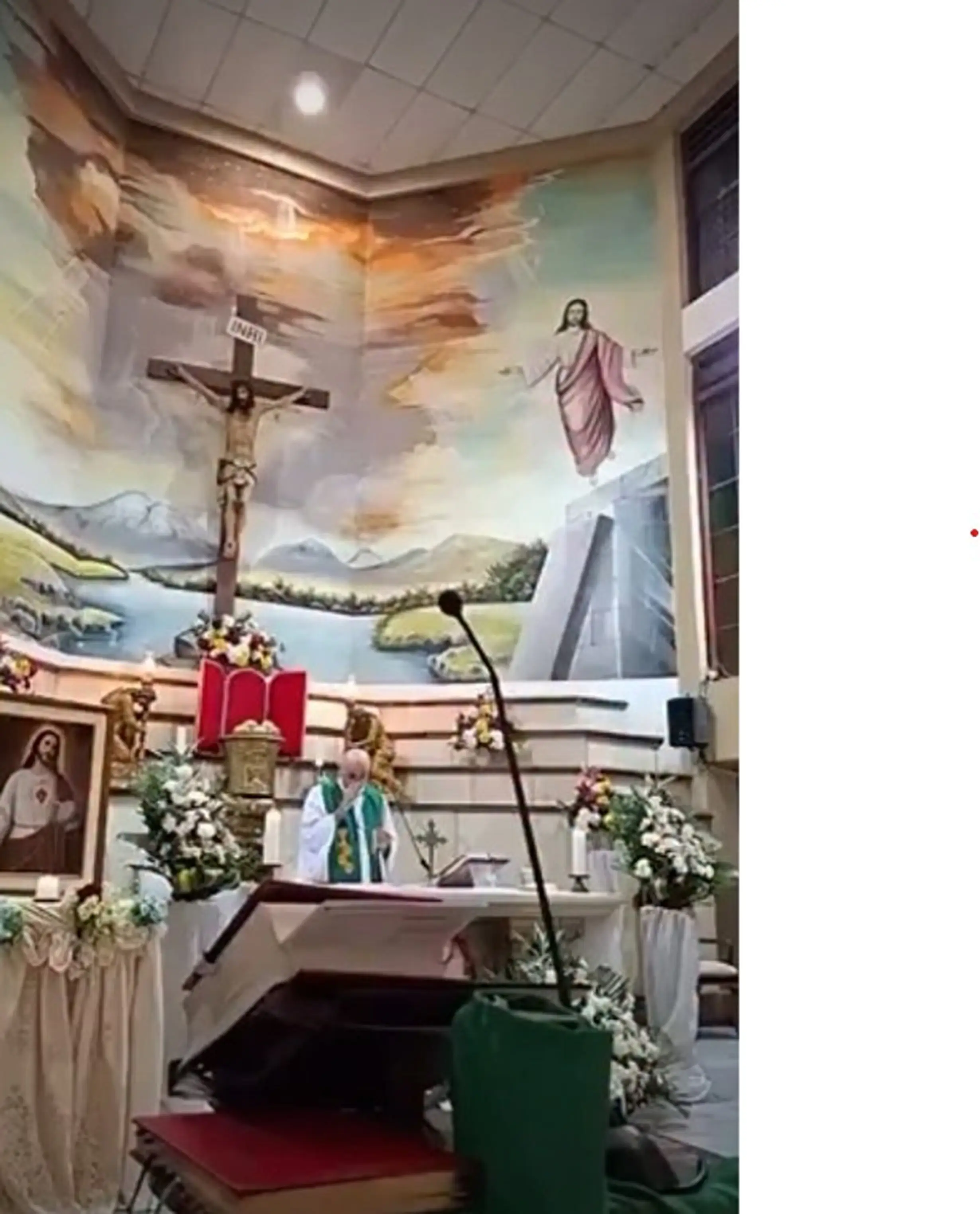 The priest was leading mass when the crucifix fell