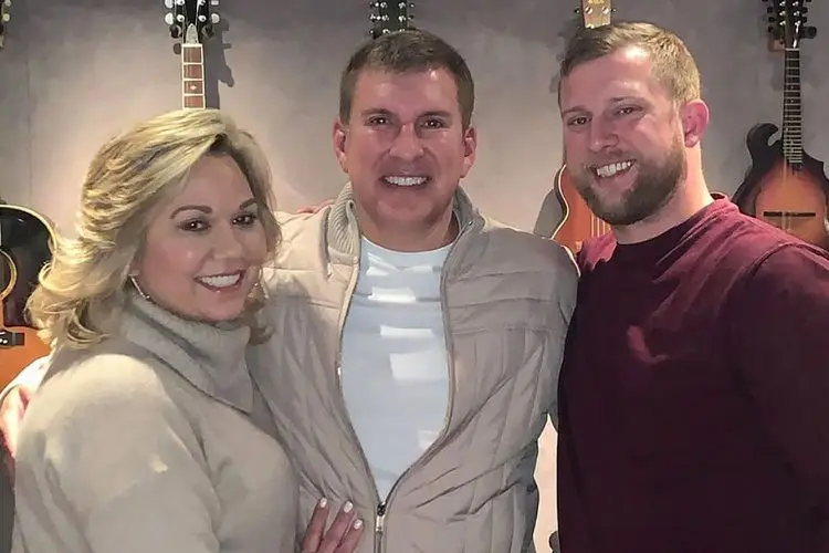 Kyle (right) is the son of Todd and step-son of Julie Chrisley (Instagram/toddchrisley)