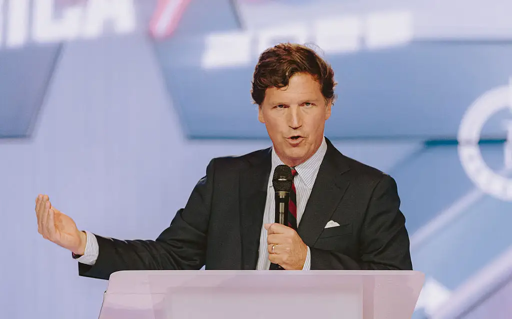 Carlson said he ‘loves Candace’ and considers her a ‘very humane and decent person’ (Photo by Olivier Touron / AFP via Getty Images)