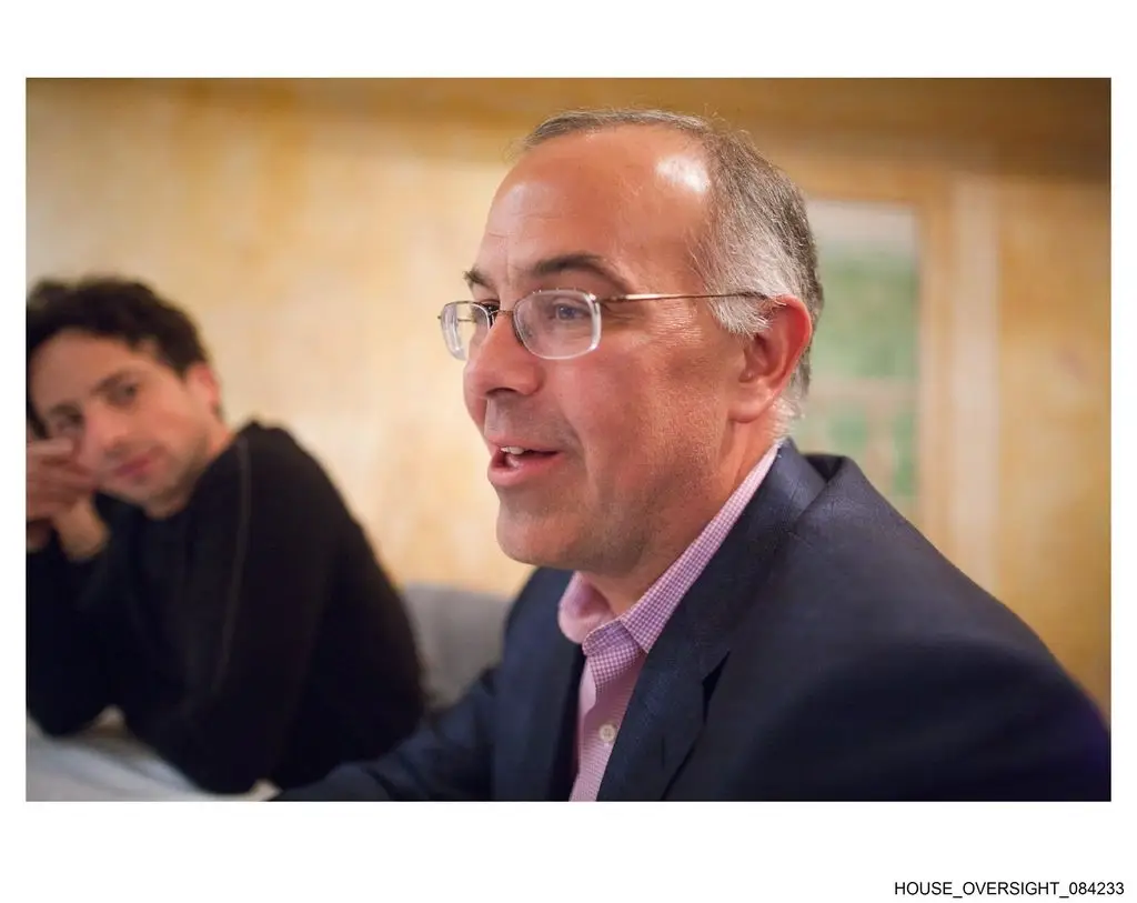 New York Times columnist David Brooks with Sergey Brin in the background (House Oversight Committee)