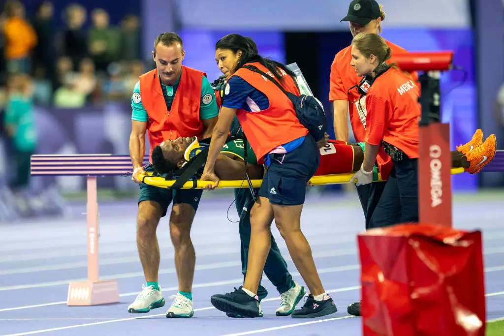 Girma was stretchered out of the Stade De France after taking a tumble. (Tim Clayton/Corbis via Getty Images)