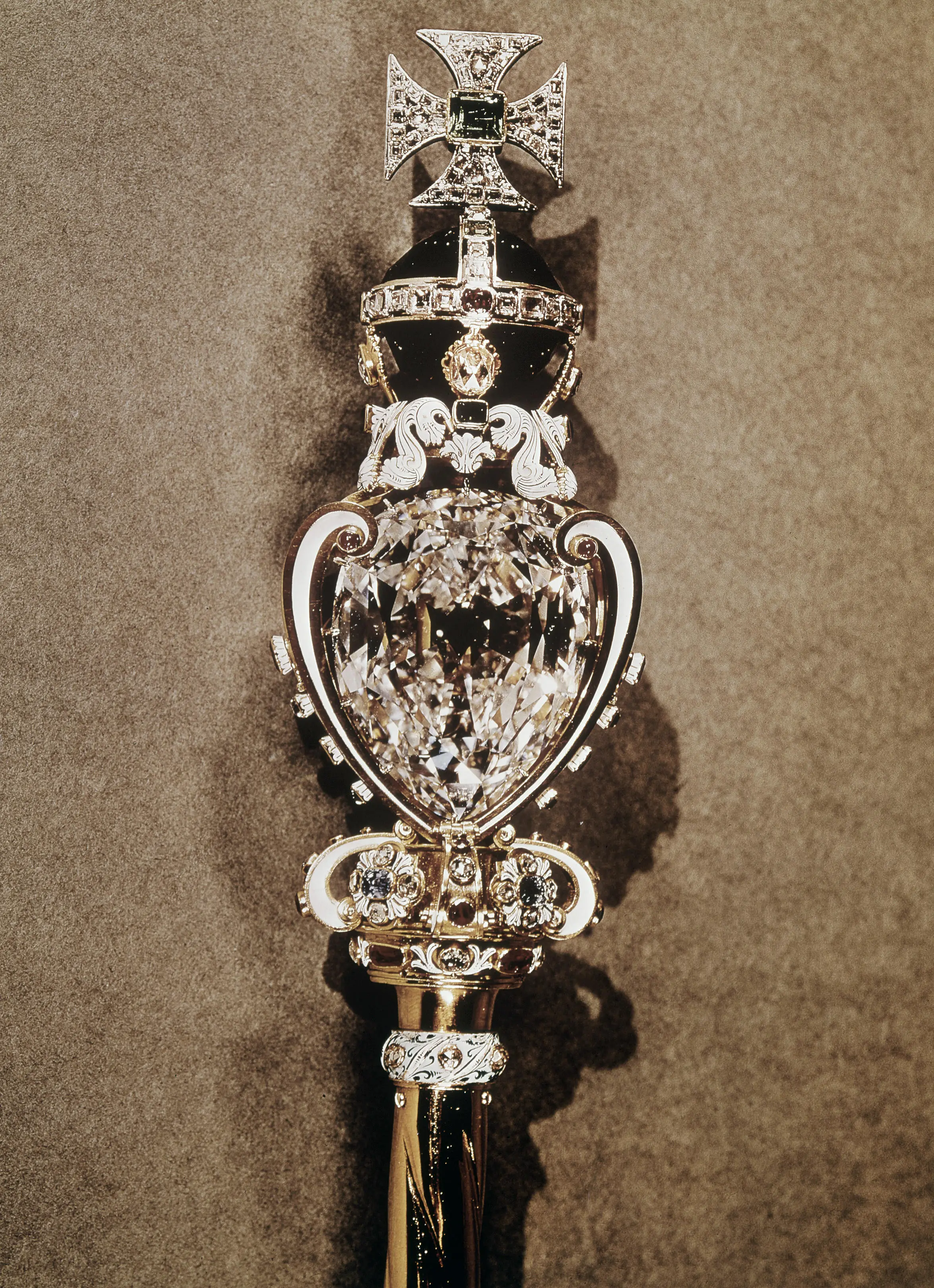 The world’s largest known clear-cut diamond sits on the end of one of the late monarch’s spectres.