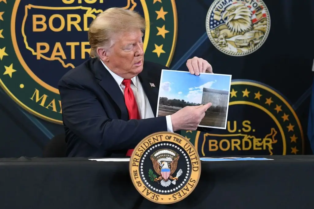 Trump and his wall (SAUL LOEB/AFP via Getty Images)