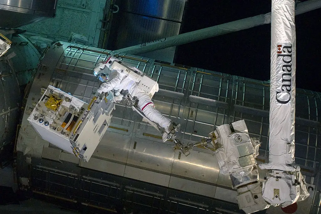 NASA astronaut Ronald Garan attached to a robotic arm on the International Space Station during a planned six-and-a-half-hour spacewalk in 2011. (NASA via Getty Images)