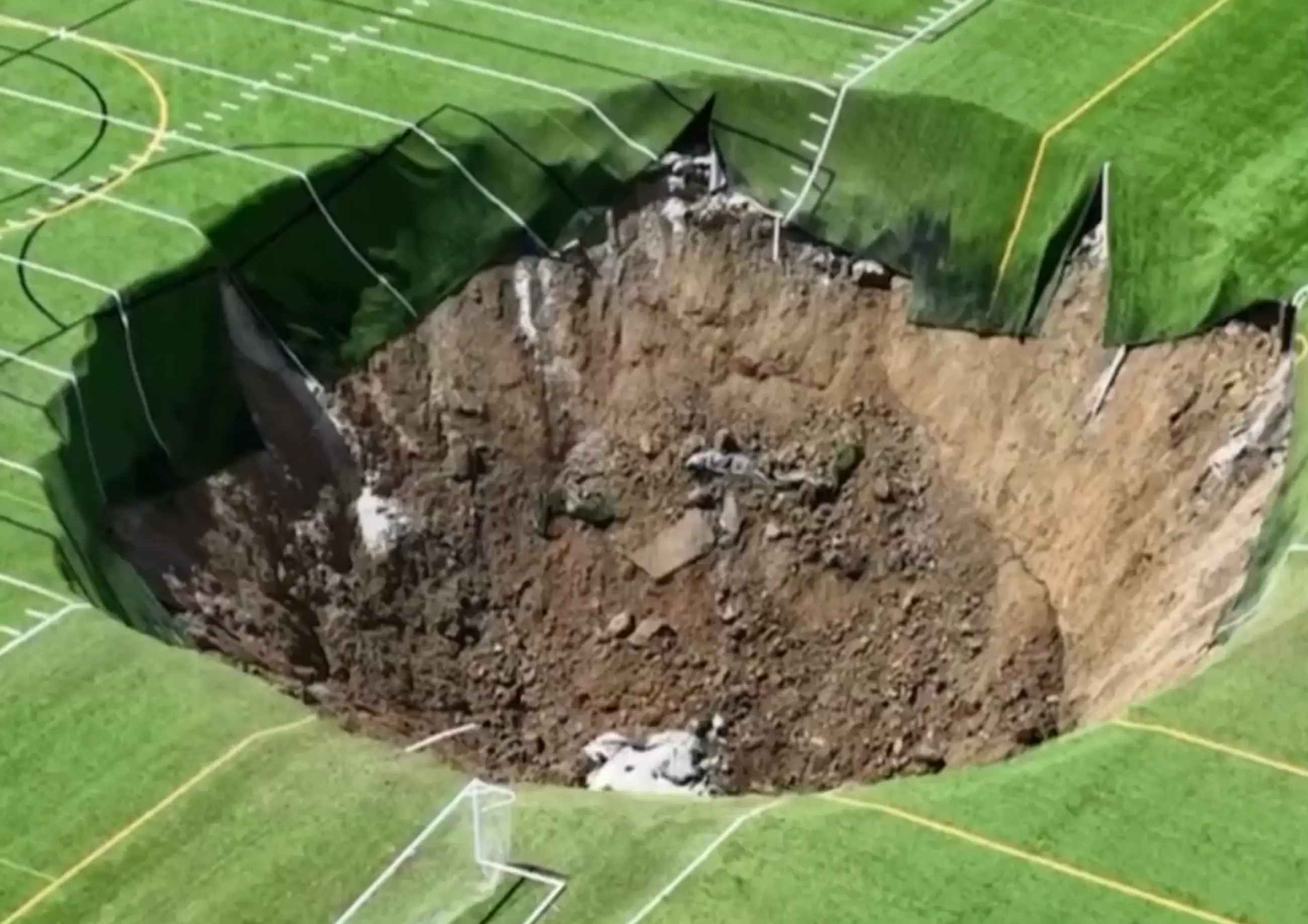 According to local reports, the sinkhole was caused by an underground mine owned by New Frontier Materials. (KSDK News)