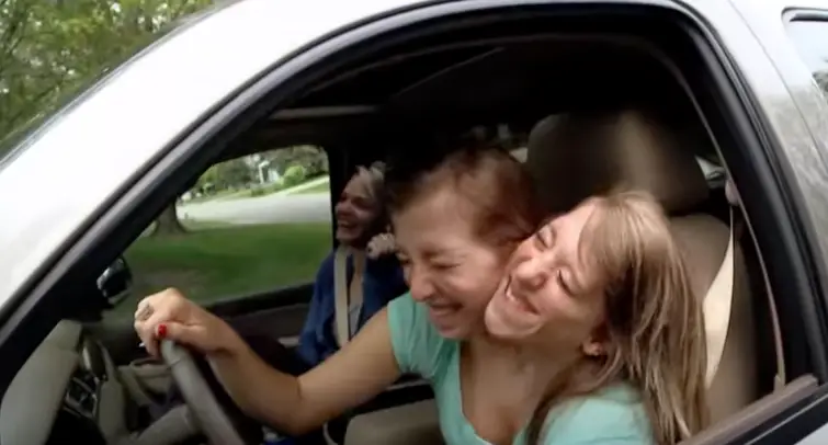 The twins can drive a car together but require separate licences (Origin/YouTube)