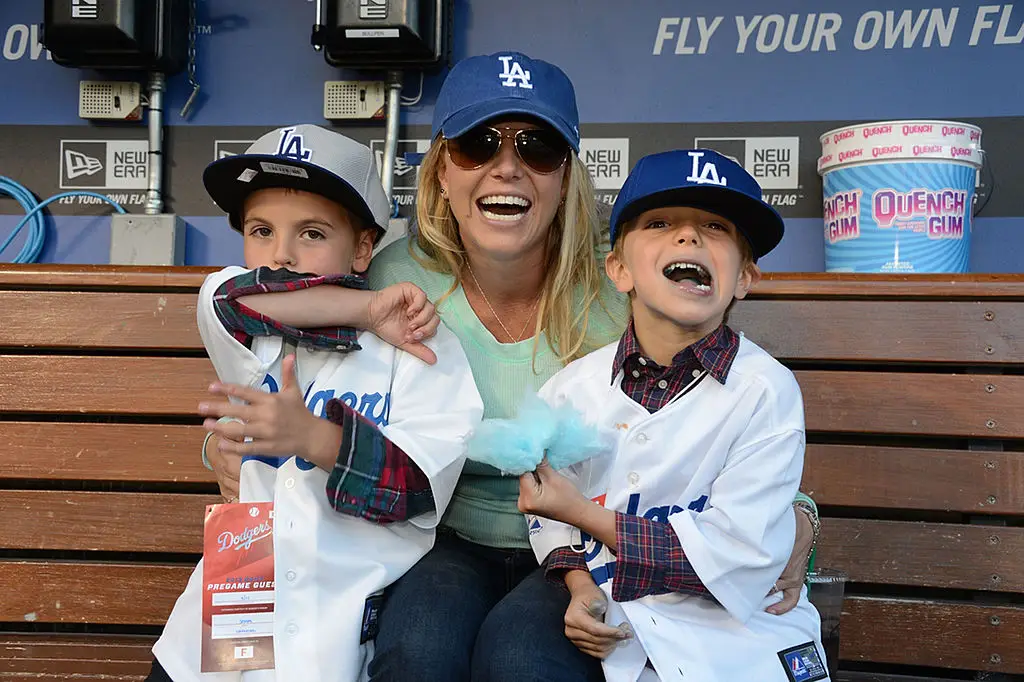 Britney Spears poses with sons Sean Preston Federline (L) and Jayden James Federline in 2013 (Jon SooHoo/LA Dodgers via Getty Images)