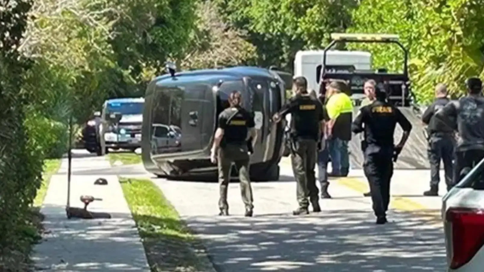 Woods' Land Rover clipped another car at speed near his Jupiter Island in Florida (WPTV)