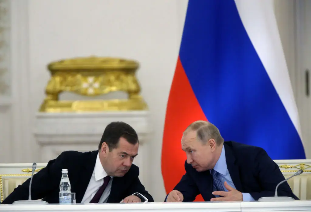 Former Russian President Dmitry Medvedev speaks to Russian President Vladimir Putin back in 2019 (Mikhail Svetlov/Getty Images)