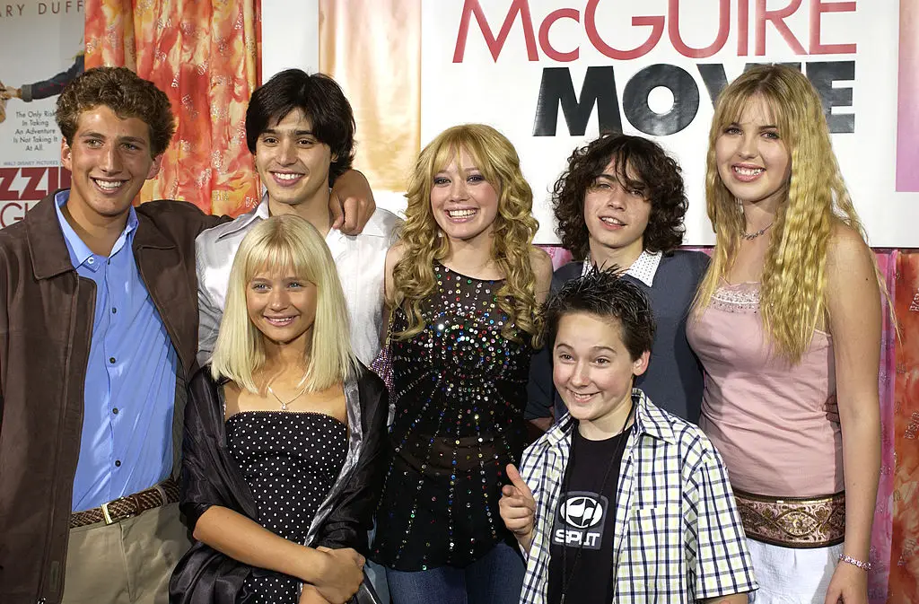 Cast of 'Lizzie McGuire' pictured back in 2003. From left: Clayton Snyder, Yani Gellman, Carly Schroeder, Hilary Duff, Jake Thomas, Adam Lamberg and Ashlie Brillaut (L. Cohen/WireImage)