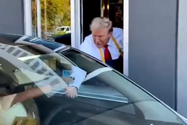 Trump appeared to serve customers in the drive-thru (TikTok/@realDonaldTrump)