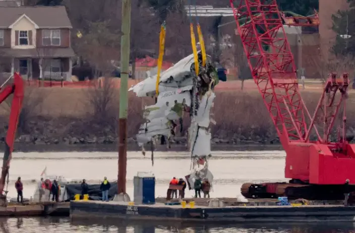 Air traffic control asked about whether the helicopter had seen the plane seconds before collision (Chip Somodevilla/Getty Images)