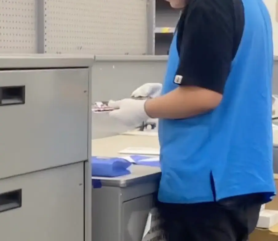 Some commenters said it's store policy to check through photos for quality assurance.