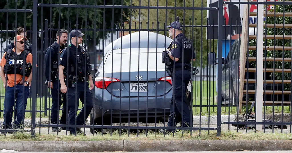 Dallas Police investigate the scene at 1120 Empire Central Place in Dallas, Texas (Stewart F. House/Getty Images