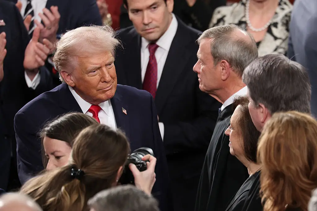President Donald Trump greeting Supreme Court Chief Justice John Roberts last month (Win McNamee/Getty Images)