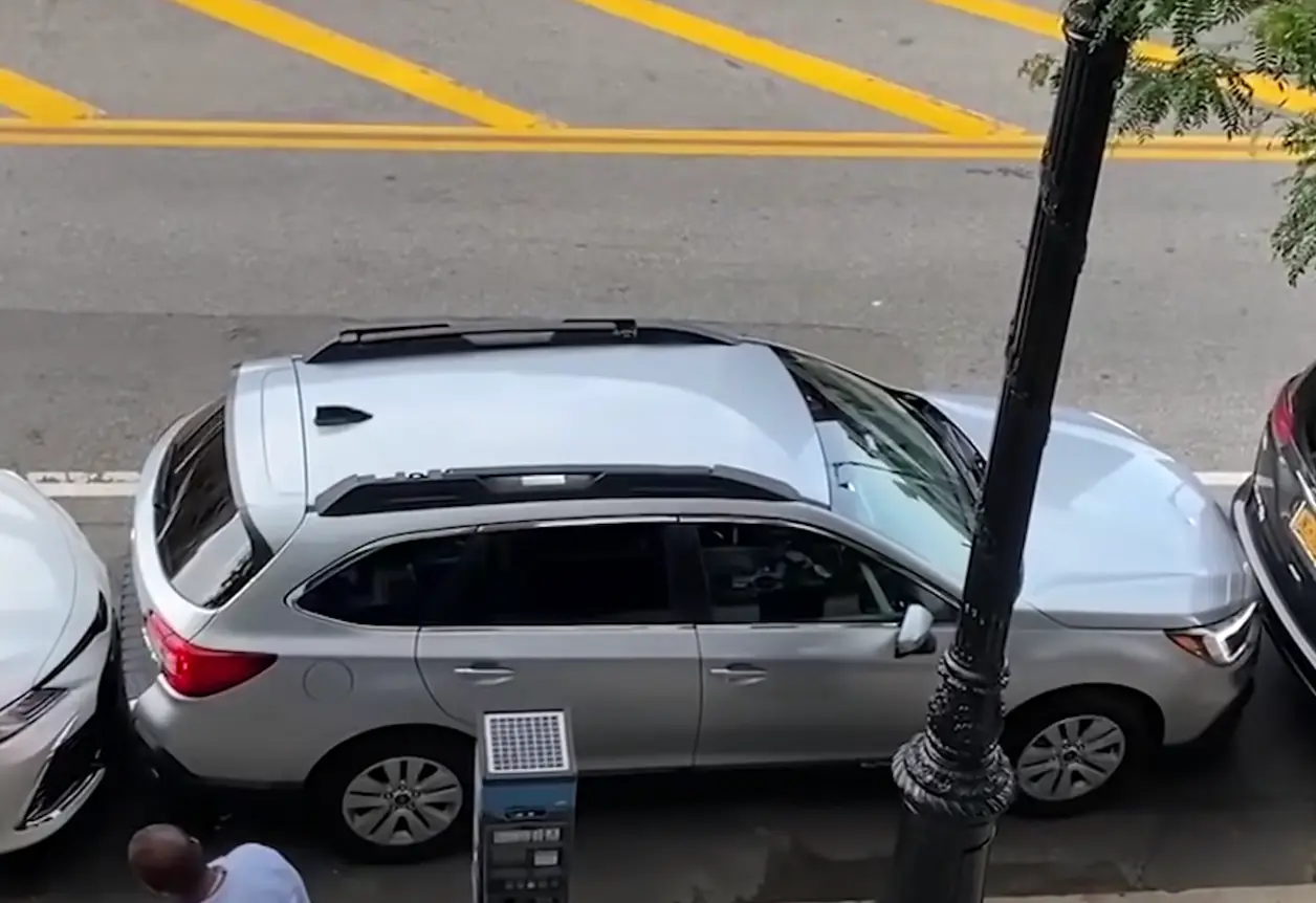 You can barely see a gap between the cars.