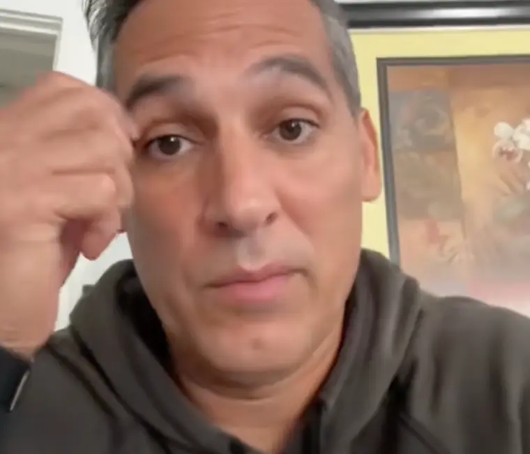 A man shared a video to TikTok accusing a fellow plane passenger of 'stealing' his Apple phone charger (TikTok/ @rcrelated1) 