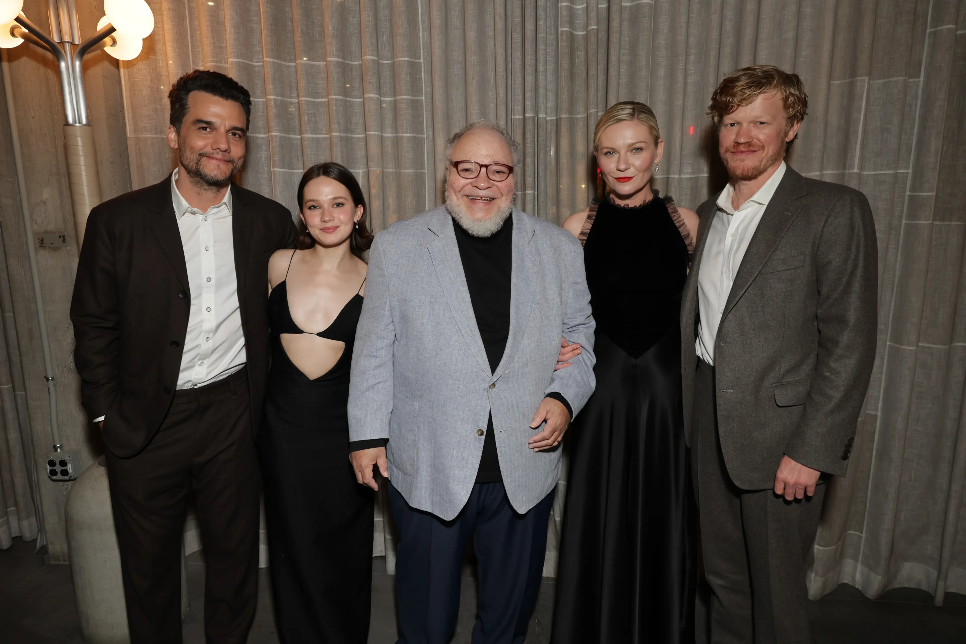 Dunst pictured with her Civil War co-stars.