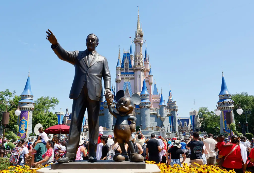 A man booked a trip to Disney World for him, his partner and her kids (Gary Hershorn/Getty Images)