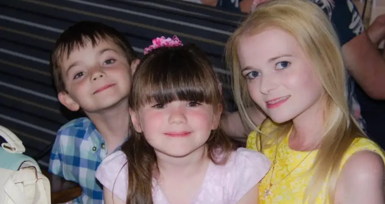 Laura Higginson (right) with her two children (Family Handout)