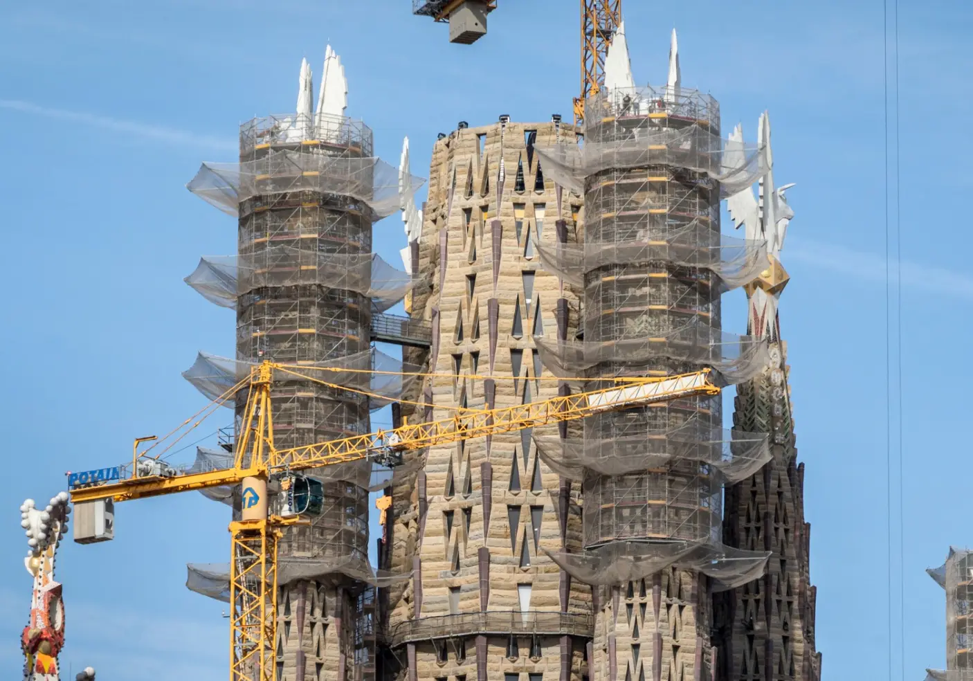 The towers were completed with the addition of two sculptures.