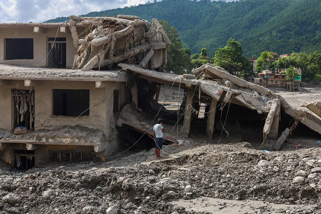 Entire buildings have been reduced to rubble after the flash floods swept down the Trishuli River, in Devighat and Nuwakot, in Nepal (Daniel Ceng/Anadolu via Getty Images)