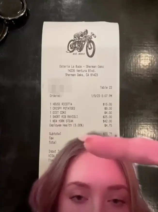 The TikToker was left shocked by the 'employee health' charge. (@ashnichole_xo/TikTok)