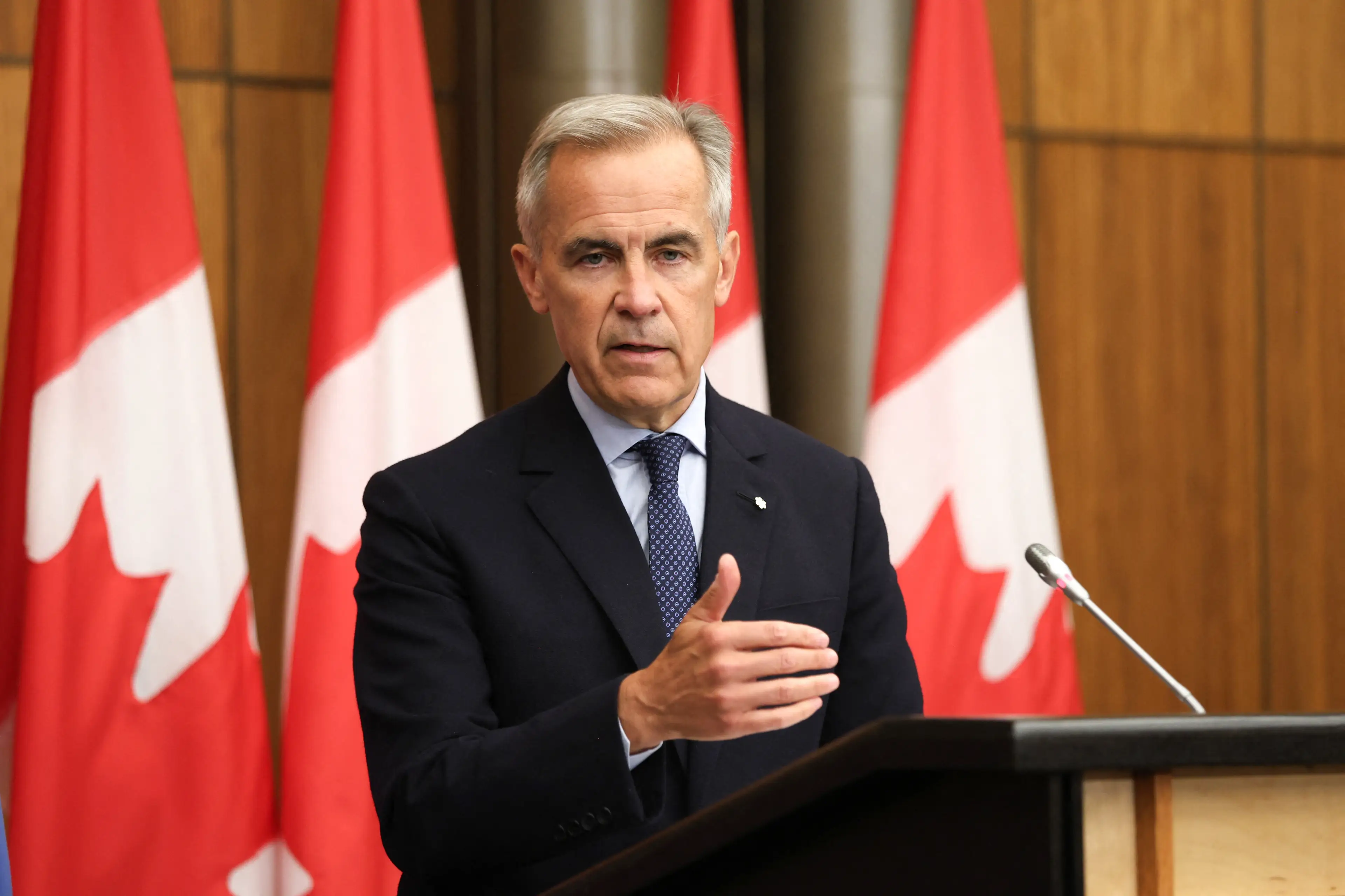 Mark Carney hit back against the US for their latest tariff move (DAVE CHAN/AFP via Getty Images)