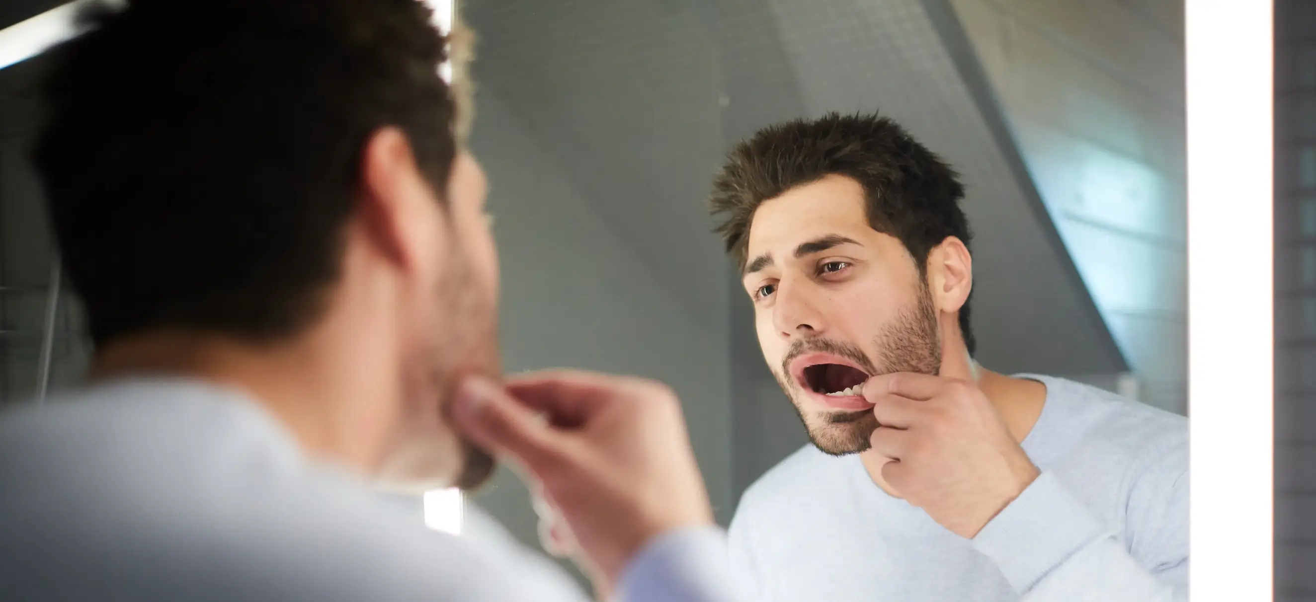 If something's not right in your mouth, don't ignore it. (Getty Stock Images)