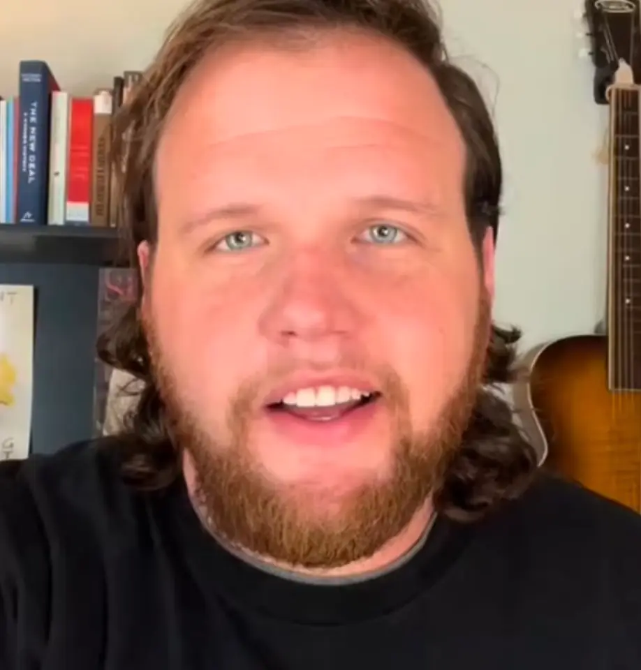 Taylor says he was fired for his TikTok videos.