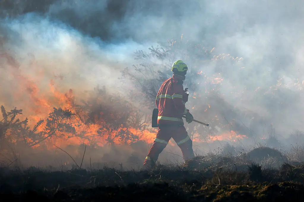 : Fire fighters bring a wildfire under control on April 30, 2026 in Bonhill, Scotland. (Photo by Jeff J Mitchell/Getty Images)