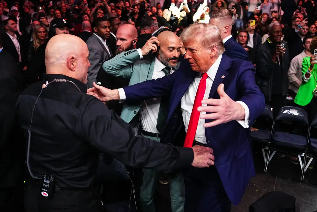 Joe Rogan greets President Donald Trump in November, days after winning the presidential campaign (Jeff Bottari/Zuffa LLC)