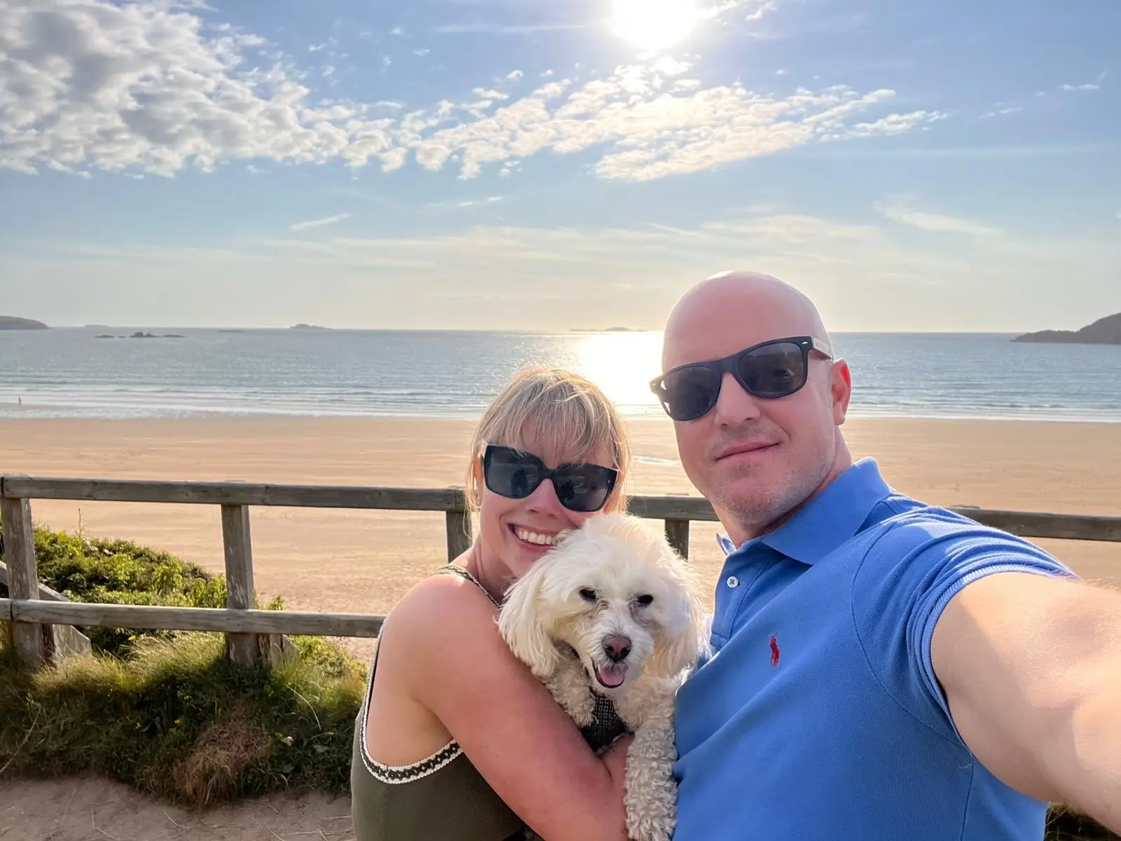 Rachel pictured with her husband Dean and their dog (Cancer Research Wales)