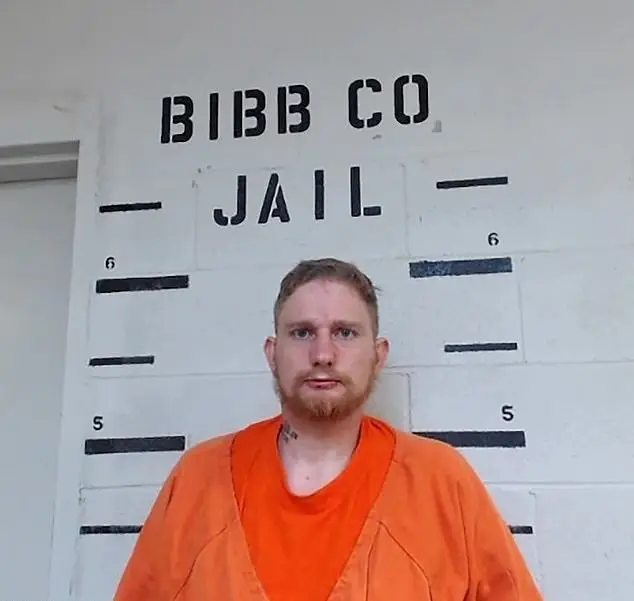 Brandon's booking photo. (Bibb County Jail)