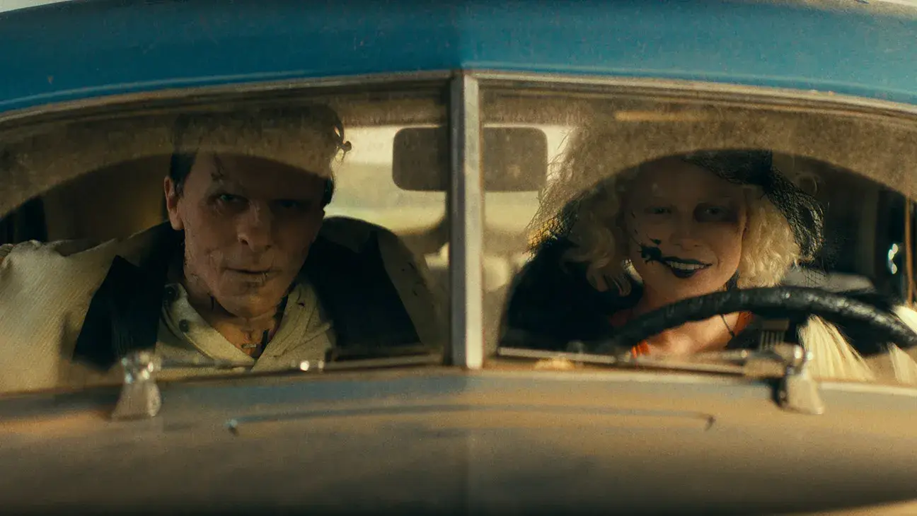 Bale stars as trigger-happy gangster Frank opposite Jessie Buckley's Ida in The Bride!, written and directed by Maggie Gyllenhaal. (Warner Bros. Pictures)