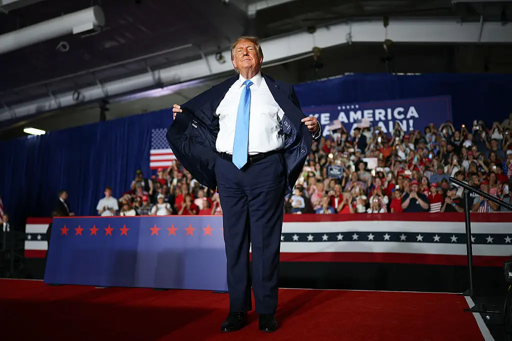President Donald Trump, who of course is famous for his toned physique, called one of the protestors at the rally 'fat' (Win McNamee/Getty Images)