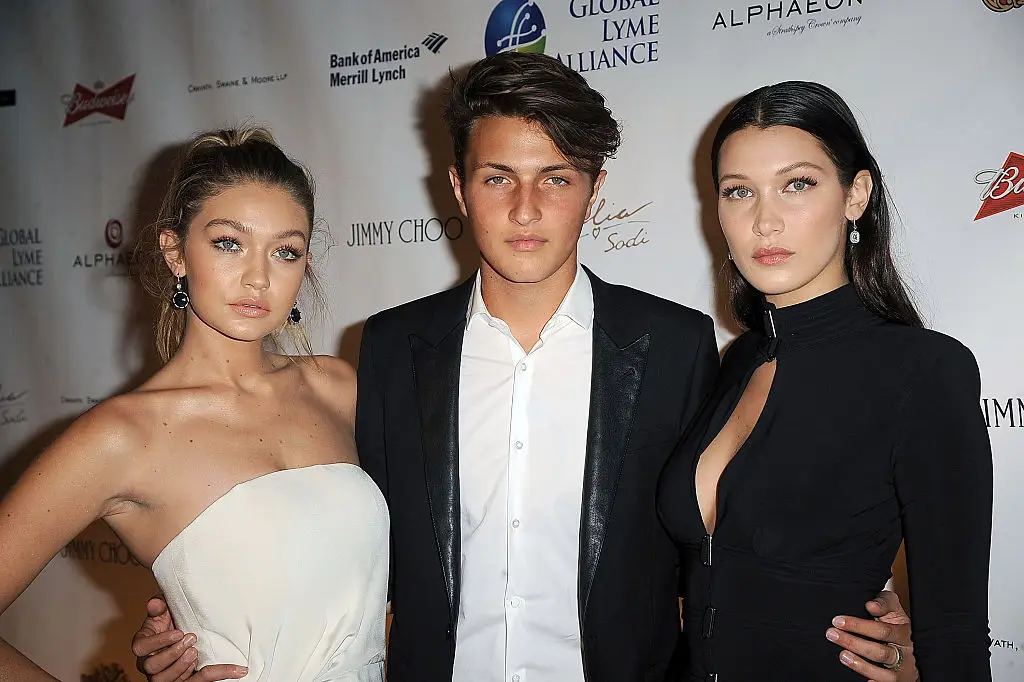 Siblings Gigi, Anwar, and Bella Hadid pictured together in 2015 (Chance Yeh/WireImage)