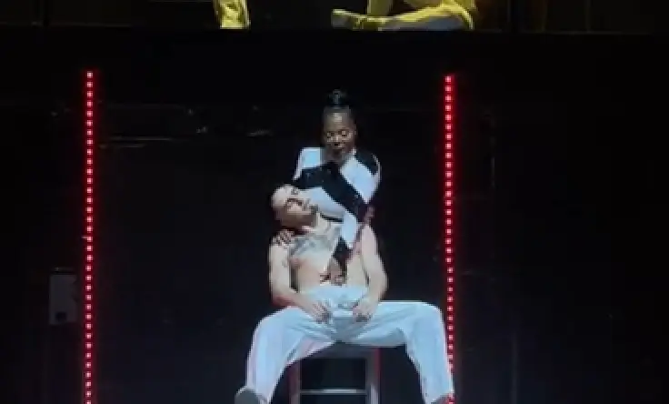 Jackson was performing on stage when her hand plunged down a backup dancer's body.