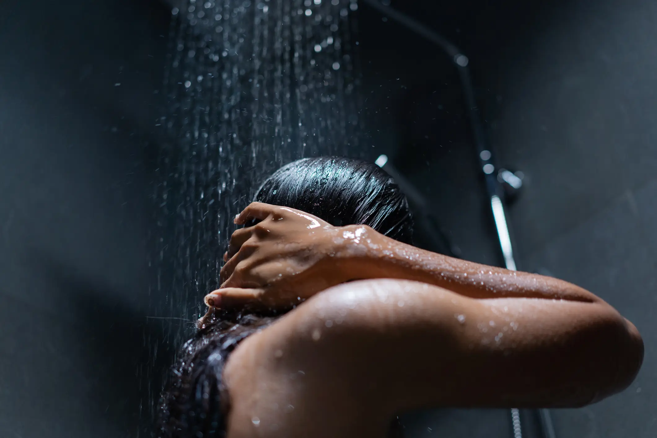 Having a 'dark shower' before bed can help with sleep (Getty Stock)