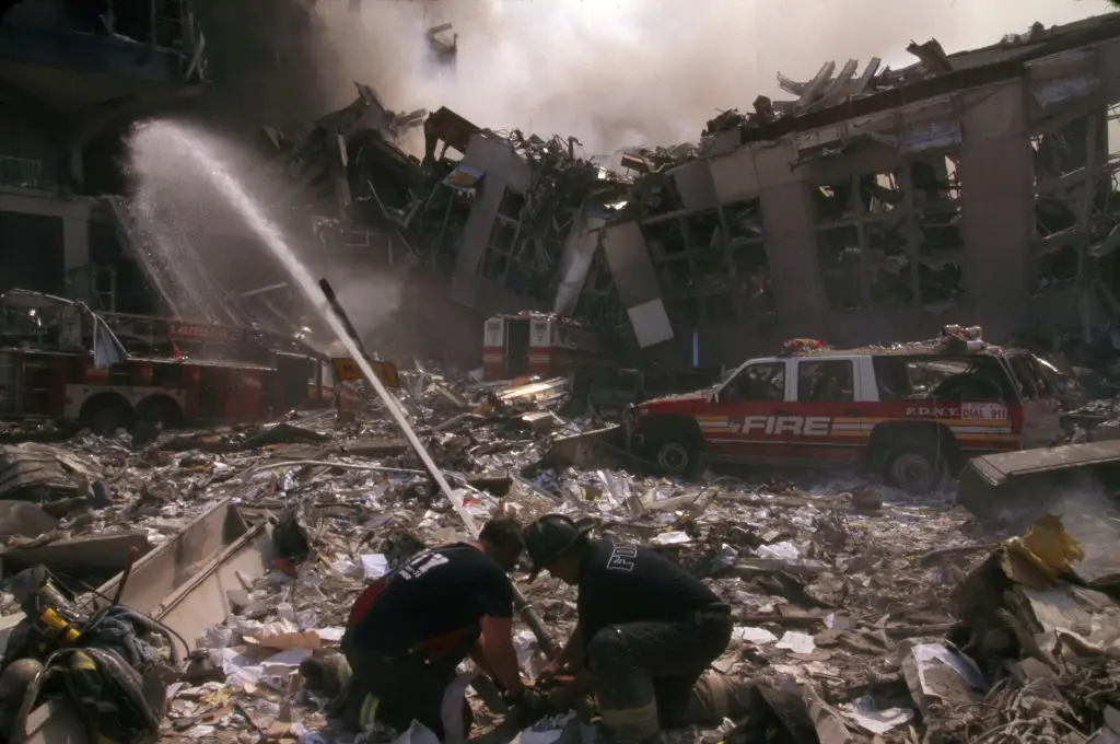 Trump claimed he was lifted and carried away by two firefighters after fears that nearby One Liberty Plaza, then known as the U.S. Steel Building, was at risk of collapsing. (Universal History Archive/UIG via Getty images)