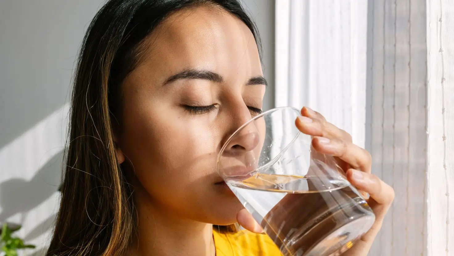 By switching to drinking filtered tap water, you could reduce microplastic consumption by 90 percent (Getty Stock Image)