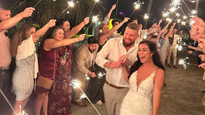 Aric and Samantha Hutchinson pictured on their wedding day just hours before tragedy (GoFundMe)