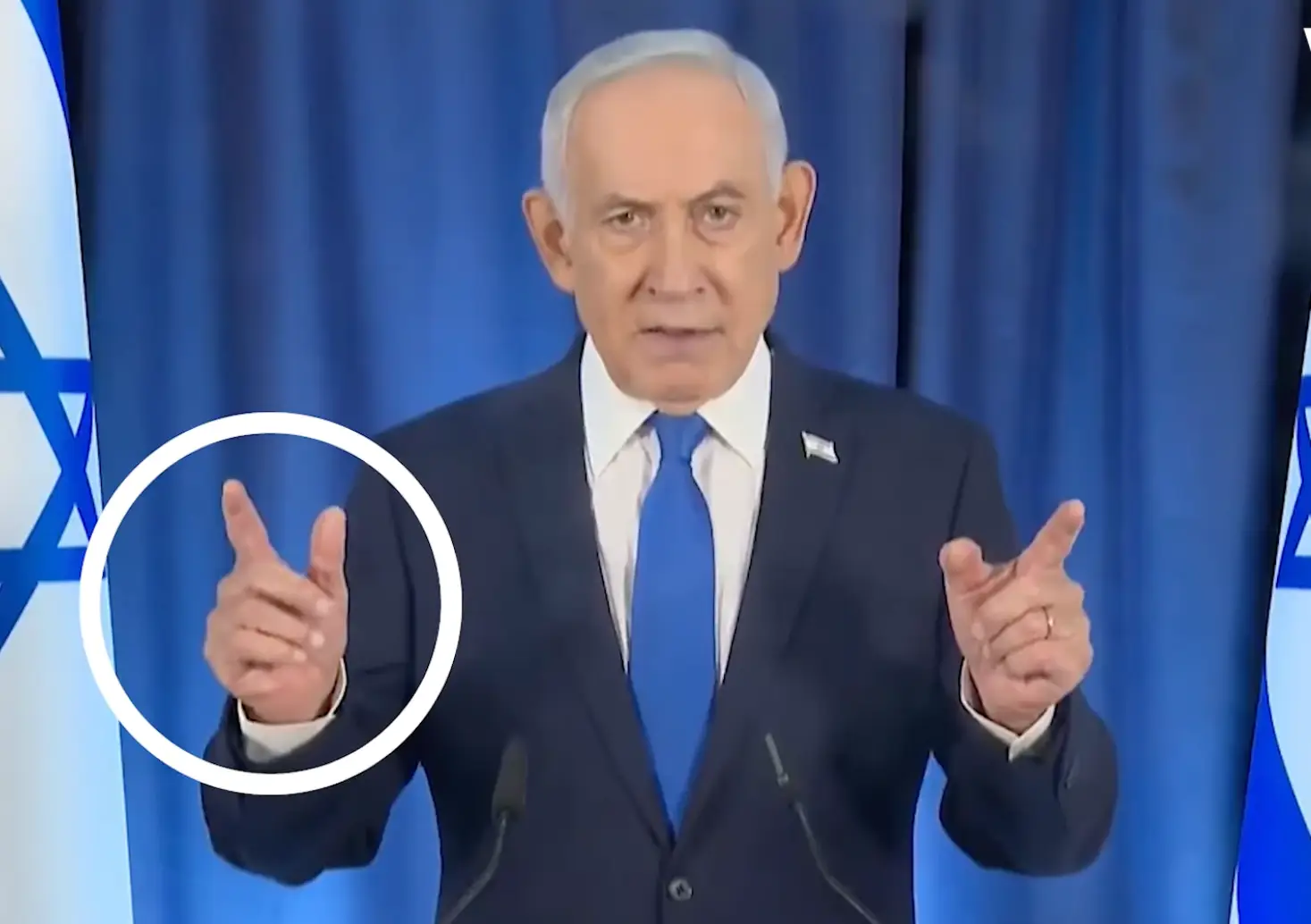 The PM appeared to have six fingers in the video (Government Press Office)